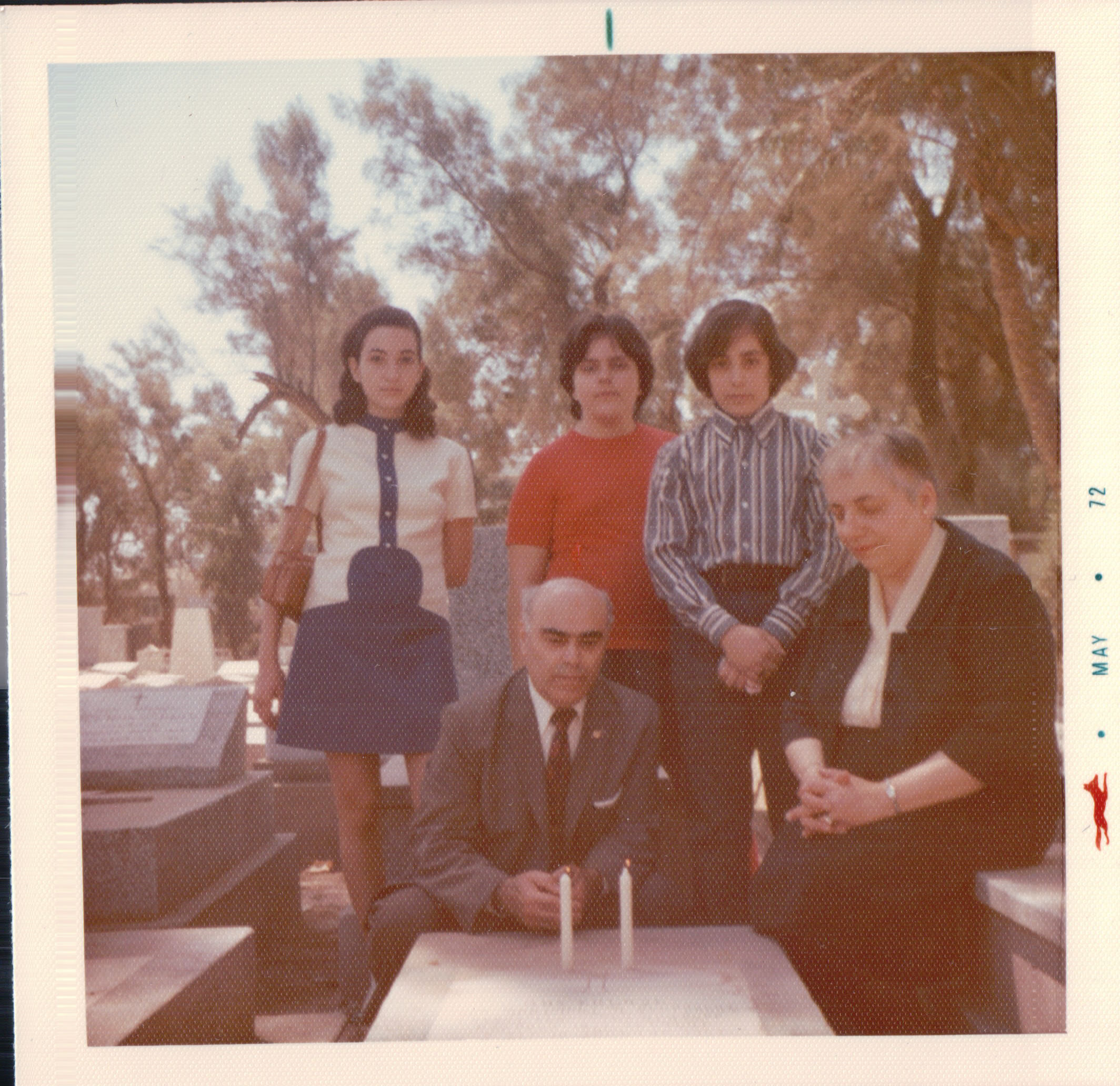 72 RRJL - Family at Grandma's grave